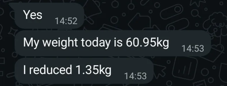 WhatsApp check-in from a client reporting her weight at 60.95 kg and a 1.35 kg reduction