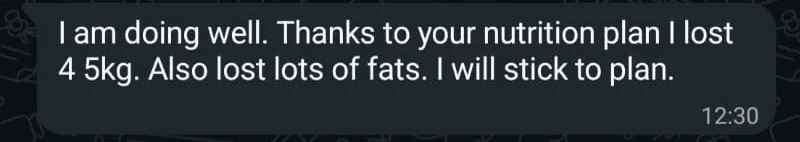 WhatsApp check-in from a client saying she lost weight and body fat on her nutrition plan